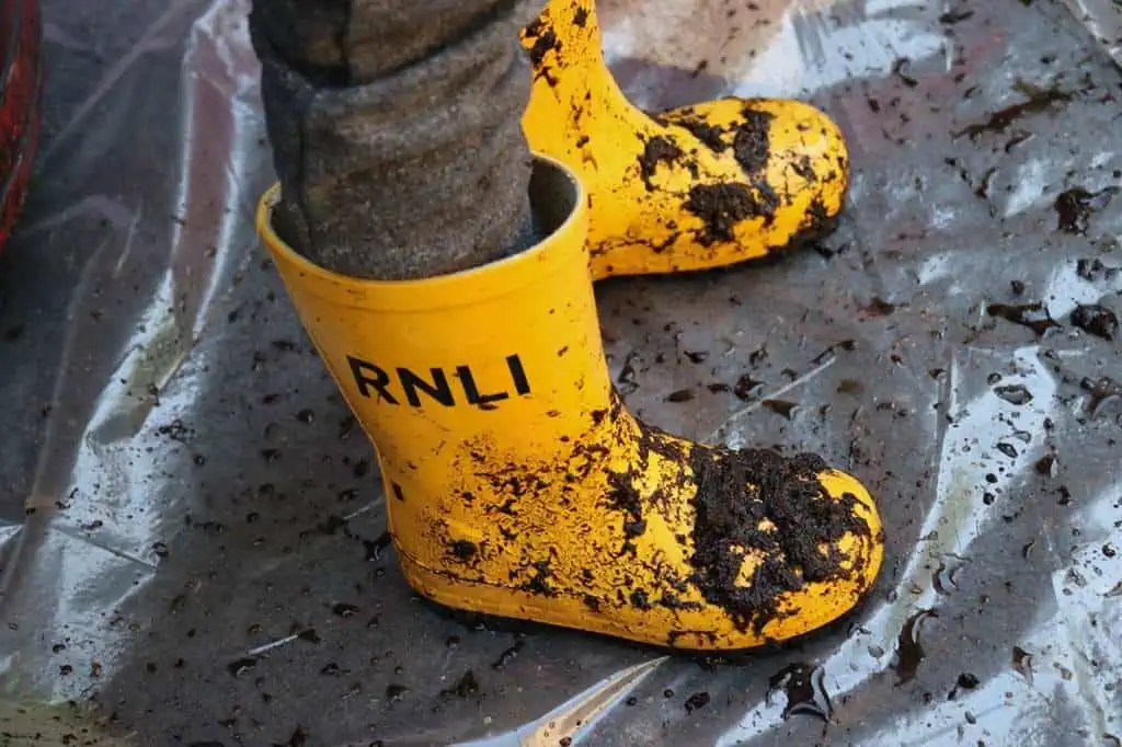 welly boots in mud welly boots in mud