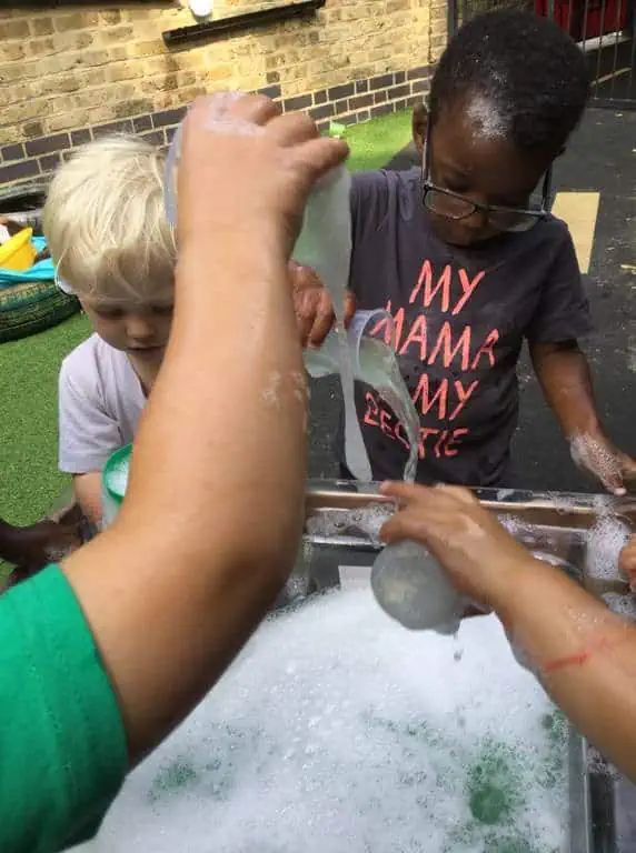 pouring bubbles with water